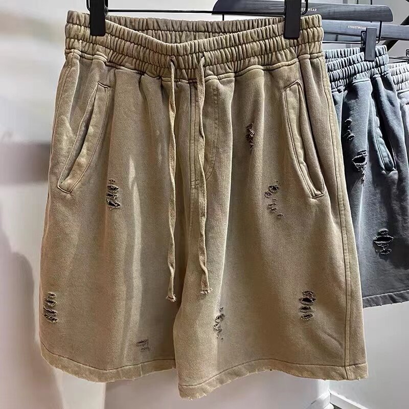 Worn-out baggy shorts, cut-up vintage shorts