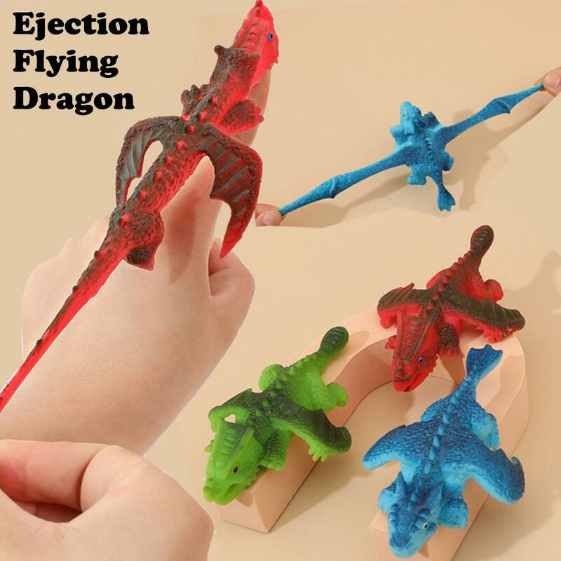 Catapulta de dinosaurio divertido, tirachinas Tricky Flying Sticky Toy, favores de fiesta, juegos elásticos antiestrés, juguetes de descompresión, nuevo