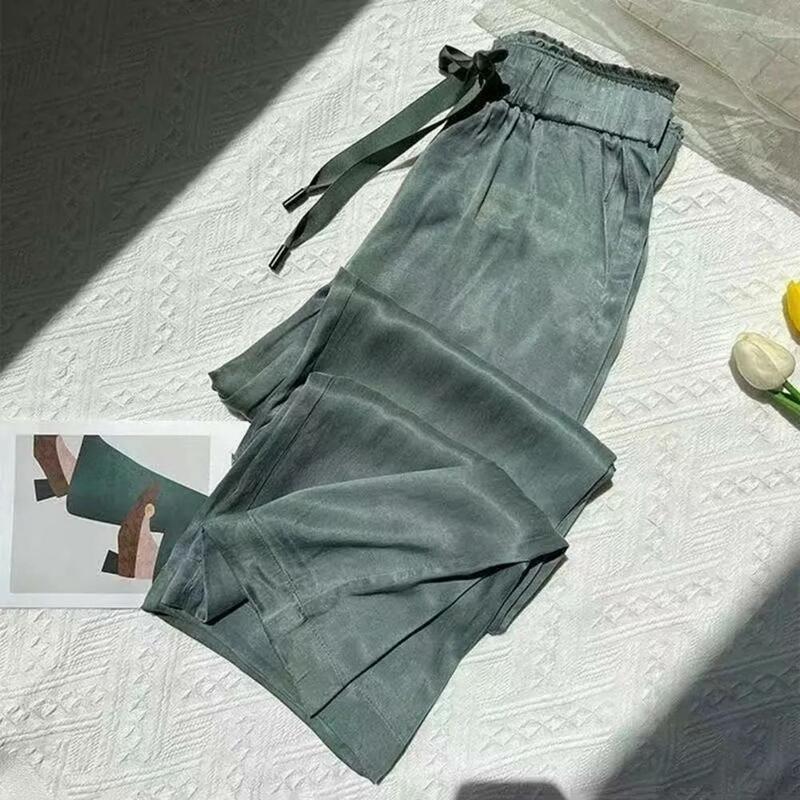 กางเกงลำลองเอวยางยืดของผู้หญิงมีสายรูดกางเกงขากว้างผ้าไอซ์ซิลค์สีพื้นสำหรับสตรีทแวร์