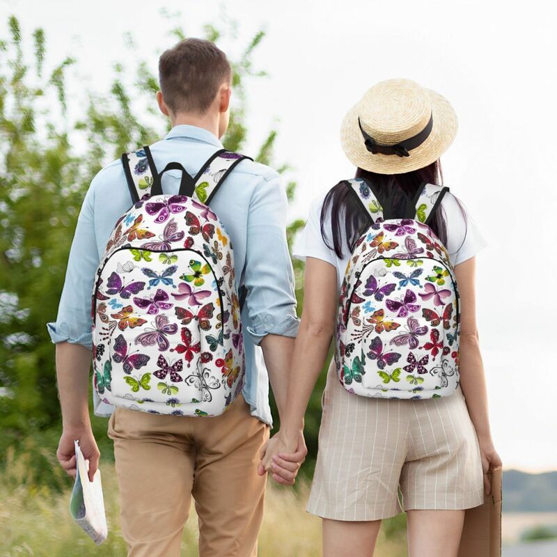 Mochila con patrón de mariposa para estudiantes de secundaria primaria, mochila colorida con bolsillo para adolescentes