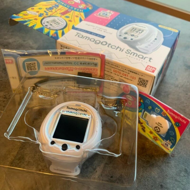 Bandai-Tamagotchi Animais Eletrônicos, Brinquedo Inteligente, 25th Anniversary Limit, White Watch Style Case, Portátil, Children Birthday Gift, Engraçado