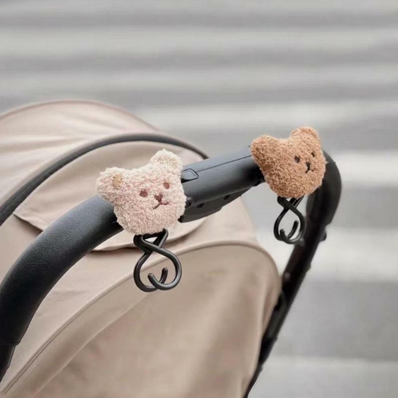 รถเข็นเด็กตะขอน่ารักหมีรถเข็นเด็กตะขอสำหรับแขวนกระเป๋าและช้อปปิ้งเมจิกสติ๊กเกอร์ Pram Hook Mommy Essentials