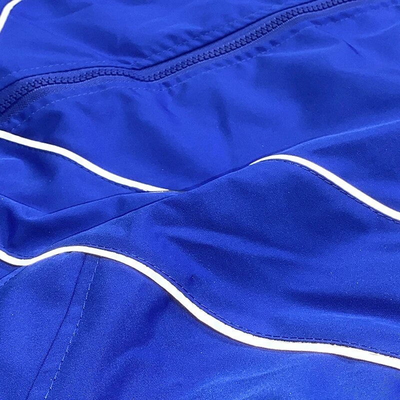 Odblaskowe kurtki w paski Hip-hopowe męskie patchworkowa, w stylu Harajuku wiatrówka z zamkiem błyskawicznym w stylu Streetwear luźne płaszcze uniwerek w kolorze niebieskim