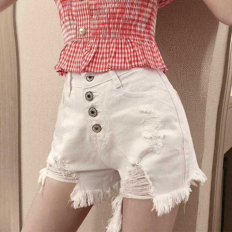 Spodenki jeansowe z wysokim stanem dla kobiet wiosna/lato nowa koreańska wersja luźna i wyszczuplająca z dziurkami modne najnowsze spodnie
