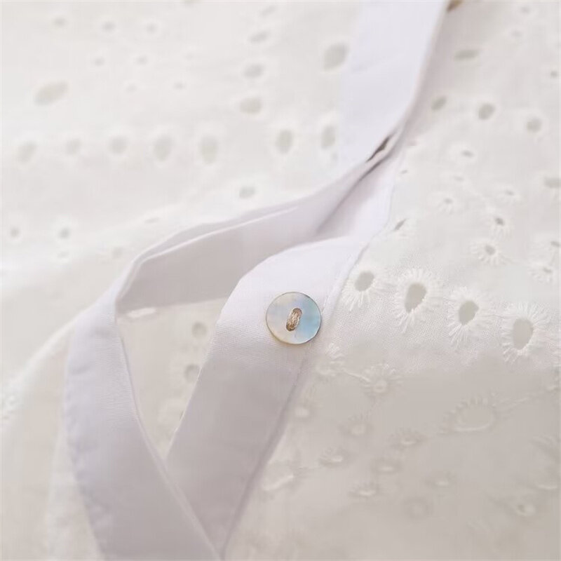 KEYANKETIAN-camisa bordada ahuecada para mujer, blusa corta de manga larga con botonadura única, Top corto, novedad de 2024