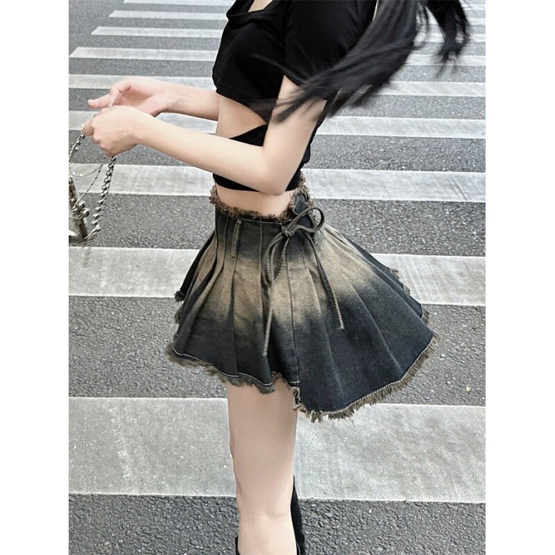 Rok lipit wanita ramping Gothic musim panas Y2k pakaian Denim anak perempuan sekolah Mini Vintage Ins mode Semua cocok desain rumbai Faldas