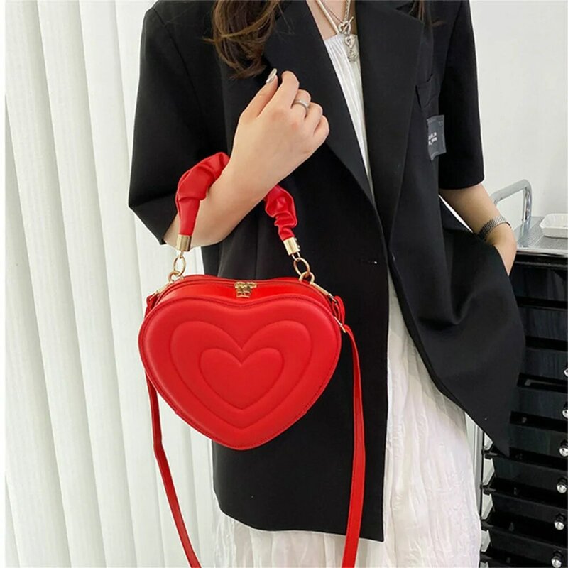 Bolsa crossbody em forma de coração para mulheres, bolsas de couro PU, bolsa estilingue casual fofa, moda amor