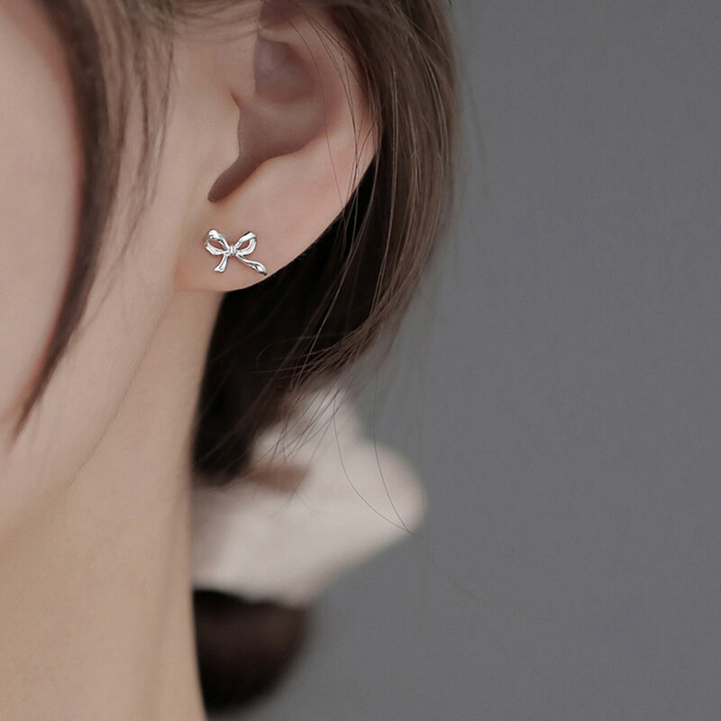 Boucles d'oreilles à nœud creux en argent regardé 2024 pour femmes, mode de fête, bijoux haut de gamme, accessoires simples, nouveau