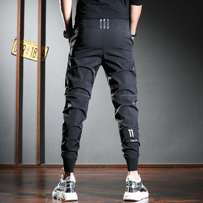 Pantalones casuales Harajuku de cintura elástica para hombre, pantalones deportivos de primavera y verano, estiramiento de piernas cónicas, Ideal para uso diario, pantalones de ejercicio