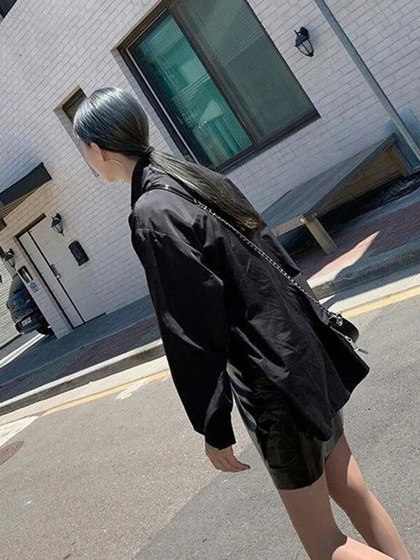 Camicia temperamento sciolto da donna edizione coreana abbigliamento donna unica Top Shirt tinta unita Casual Design elegante asimmetrico