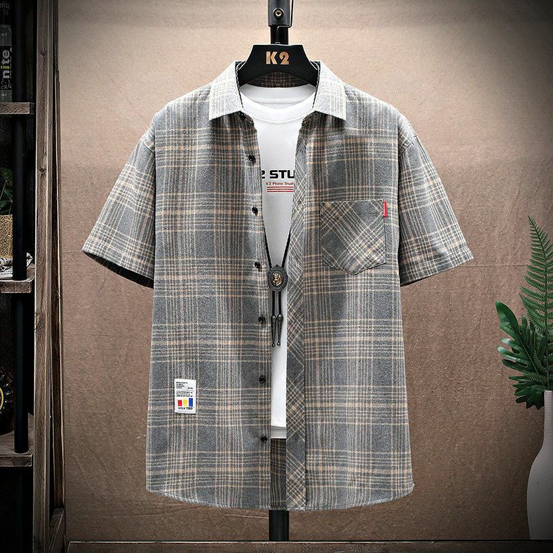 Camiseta de botão de lapela masculina, bolsos soltos emendados, malha de treliça, tops casuais grandes, camisa que combina com tudo, nova moda, roupas de verão, 2022