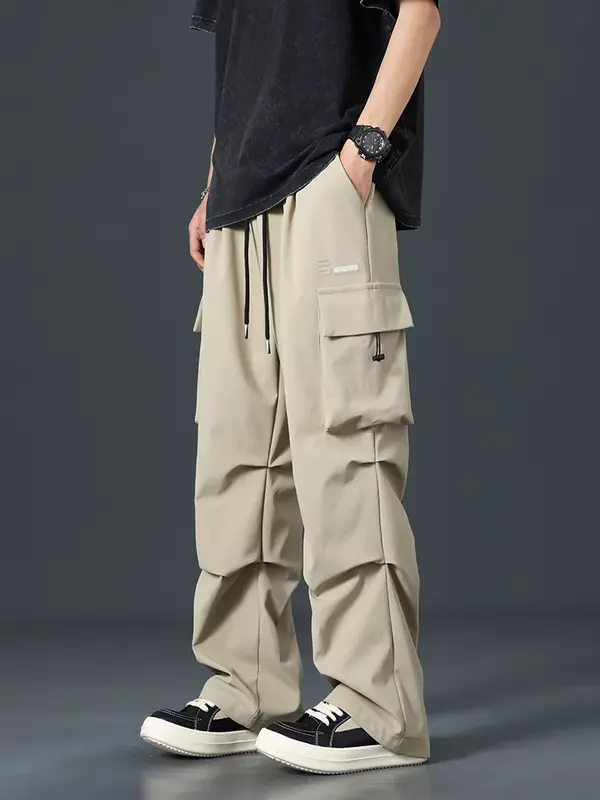 2024 nowe letnie spodnie Cargo męskie Streetwear z wieloma kieszeniami spodnie z szerokimi nogawkami, na co dzień męskie luźne proste spodnie Plus rozmiar 8XL