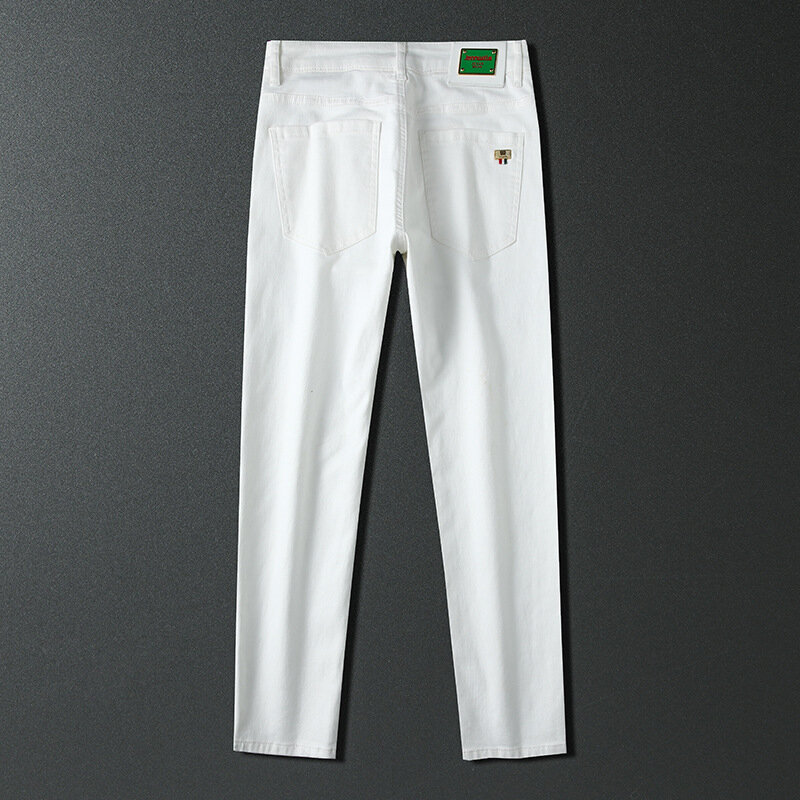 Jeans estivi sottili alla moda da uomo street all-match moda semplice pantaloni skinny slim fit tinta unita di fascia alta