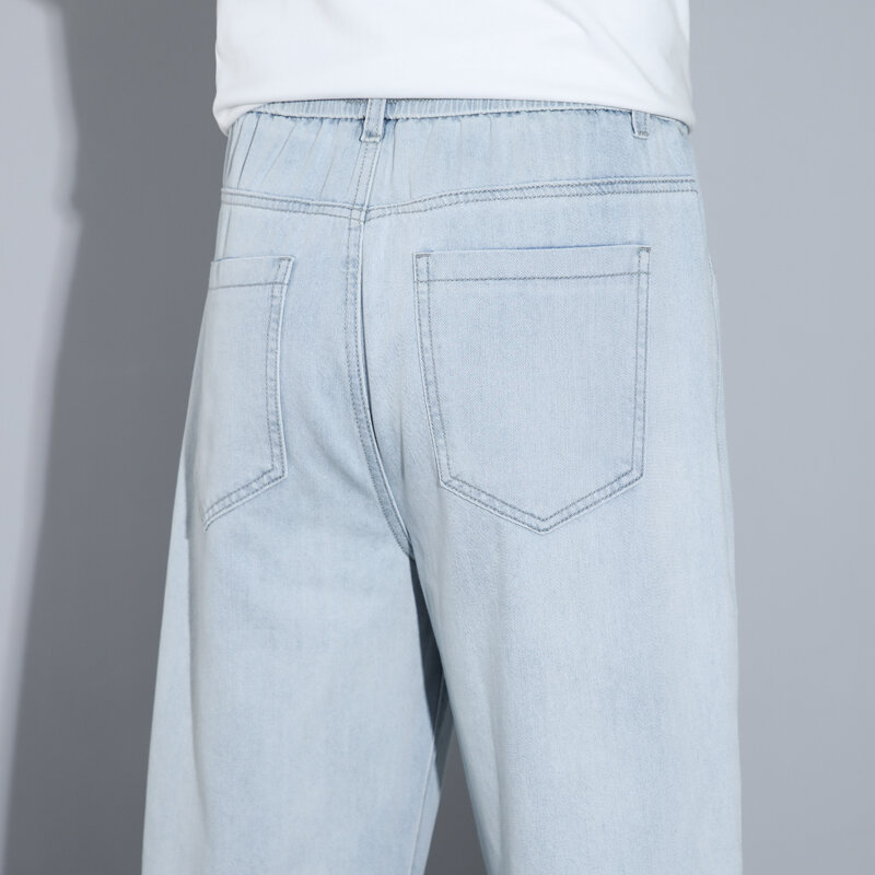 กางเกงยีนส์ขาบานสำหรับผู้ชาย2024ใหม่ฤดูร้อนกางเกงยีนส์ผ้าไอซ์ซิลค์นุ่มสไตล์อเมริกันไฮสตรีท