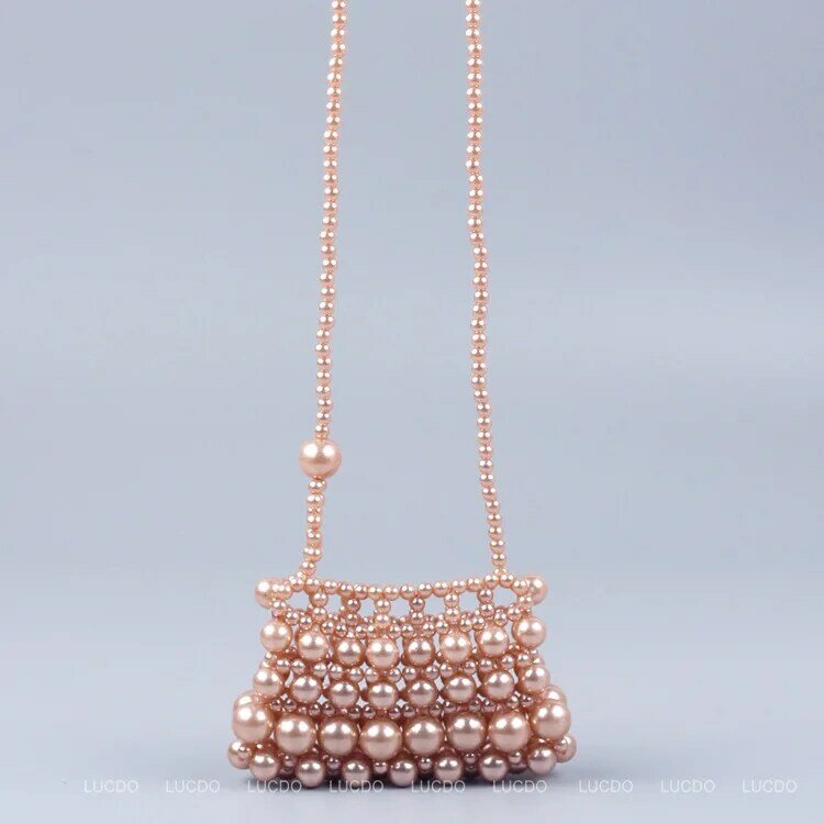 Piccole perle di perle che ripristinano i modi antichi Design manuale Fairy Joker Mini Bag Summer Girl indossato una borsa da spiaggia a tracolla