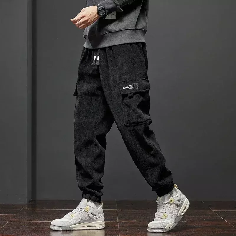 Męska sztruksowa haremowa Cargo spodnie z elastyczną talią na co dzień spodnie dresowe do biegania wiosna jesień armyzieleń szara czarne spodnie Streetwear