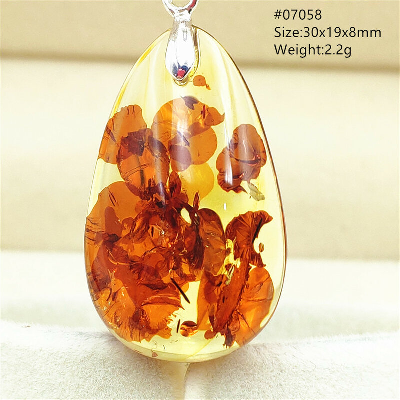 ธรรมชาติ Piebald Amber สร้อยคอจี้รูปไข่ Water Drop สีแดงสีเหลือง Amber สร้อยคอจี้เครื่องประดับหิน Reiki AAAAAA