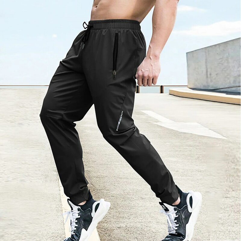 Celana panjang pria, celana panjang regang kasual pinggang elastis Jogging luar ruangan latihan kebugaran bernafas musim panas