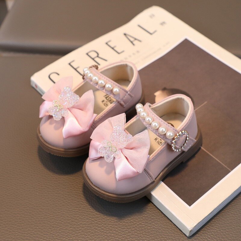 Chaussures en cuir pour bébés filles, chaussures de princesse avec nœud perlé, semelle souple peu profonde, chaussures simples mignonnes pour les premiers marcheurs des nourrissons et des tout-petits