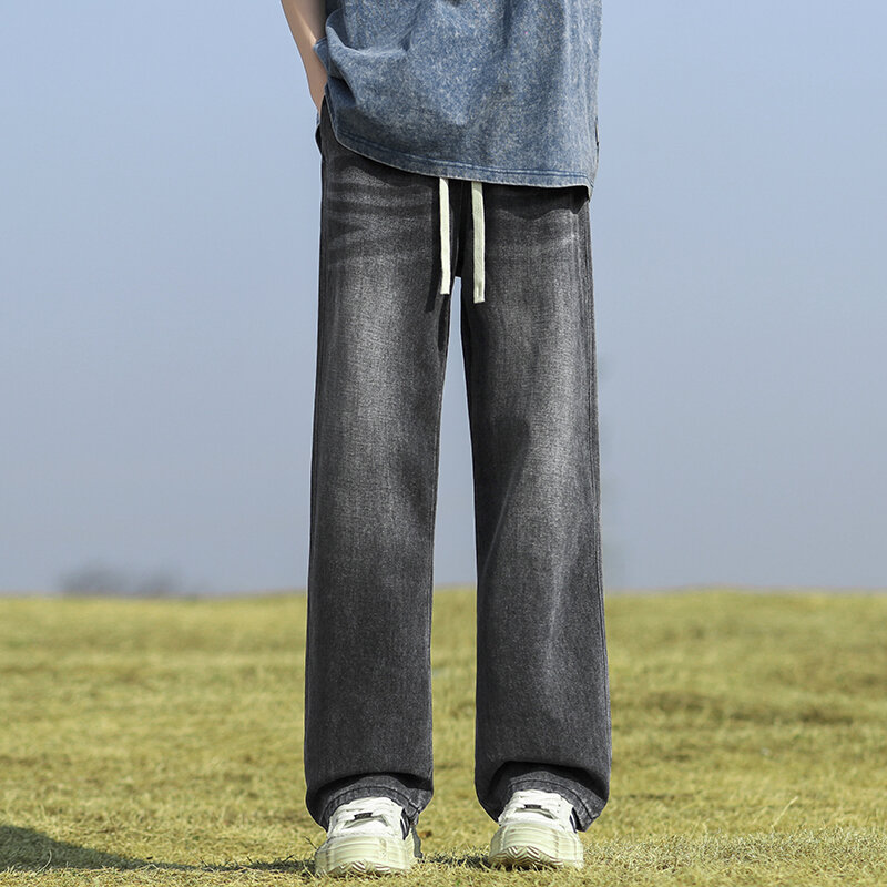 Wiosenne i jesienne męskie dżinsy główna ulica spodnie z szerokimi nogawkami modne spodnie z mopem sprane gumowe spodnie ze sznurkiem