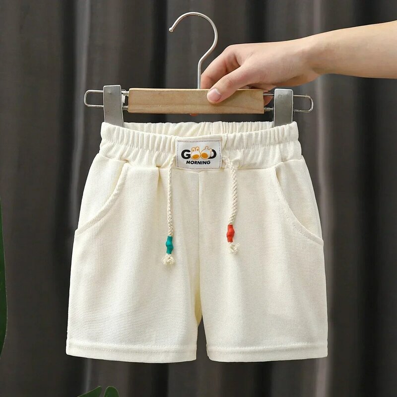 Pantalones cortos de verano para niños, Shorts de playa de Color caramelo, informales, con cintura elástica, ropa deportiva, prendas de vestir