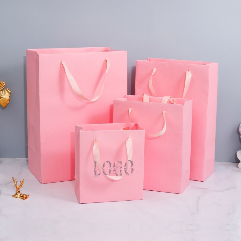 Producto personalizado, embalaje de cartón de Boutique de tela personalizada, bolsa de papel rosa mate barata con su propio logotipo para Sm