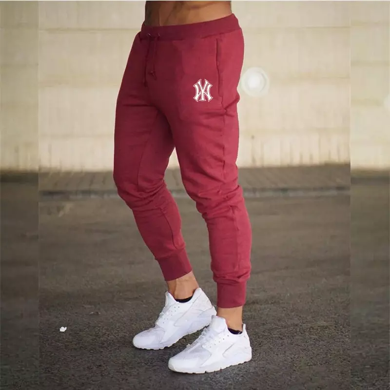 2024 wiosna/lato męskie lekkie wysokiej jakości oddychające elastyczne spodnie casual fitness modne sportowe spodnie do joggingu