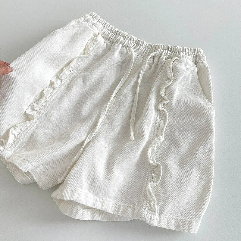 Celana pendek Denim putih untuk wanita, celana pendek jins kaki lebar motif tambalan padat pinggiran lipit elastis musim panas untuk wanita