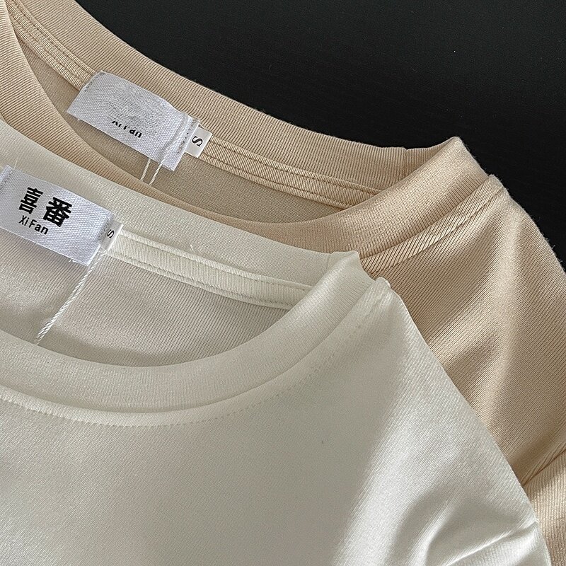 Camiseta informal de manga corta para mujer, jersey de cuello redondo que combina con todo, moda Chic de nicho, novedad de verano 2023