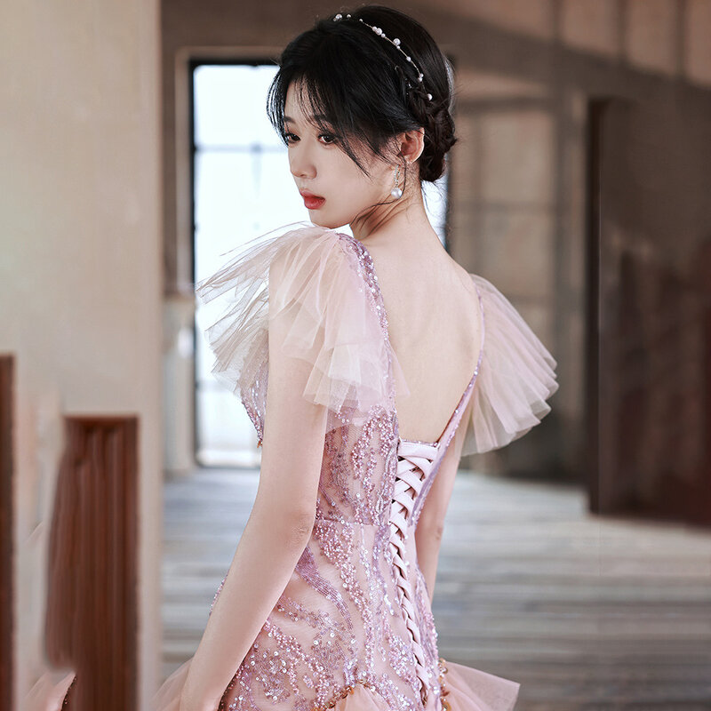 ฤดูร้อนสีชมพู Dress Model Baru อารมณ์สีขาวและบางลึก V ผ้าพันคอปลอกแขนแบบมีระบายชุดโรแมนติกสไตล์หวาน