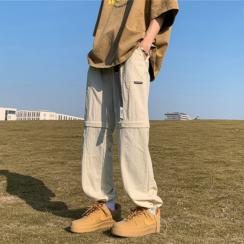 Spodnie Cargo męskie główna ulica jednolita moda styl japoński na zamek błyskawiczny zdejmowane spodnie letnie nastolatki oddychające codziennie wszechstronne