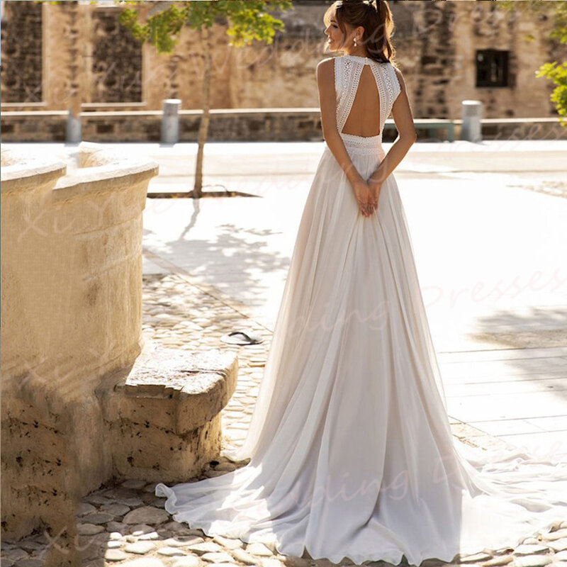 Artystyczne proste suknie ślubne z okrągłym dekoltem nowoczesne koronkowe bez rękawów szyfonowe suknie ślubne bez pleców sukienki na zamówienie de Novia