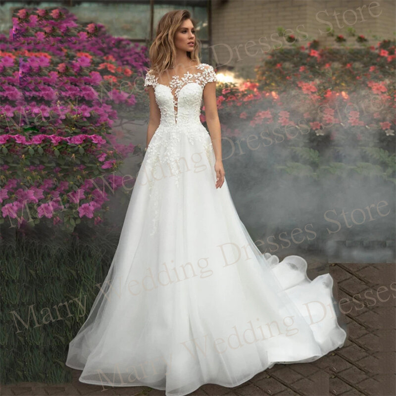 Pełne wdzięku suknie ślubne z krótkim rękawem, nowe koronkowe aplikacje z iluzją sukni ślubnej hojne klasyczne tiulowe Vestidos Para Mujer