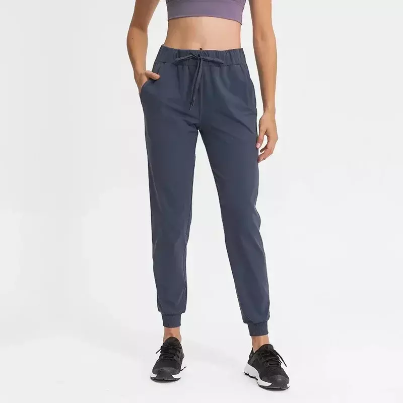 Lulu rozciągliwe tkaniny damskie legginsy spodnie sportowe z dwoma boczne kieszenie moro luźny krój sportowe aktywne, chude spodnie do kostek