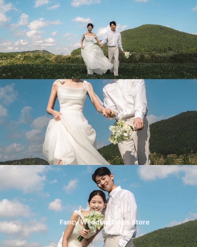 ชุดแต่งงานสไตล์เกาหลีสีงาช้างมีสายคาดเอวสำหรับถ่ายภาพชุดเดรสแขนกุดผ้าโปร่งบางมีซิปด้านหลัง
