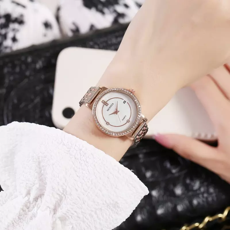 สายพานเหล็กนาฬิกาผู้หญิงปฏิทินประดับเพชรเพื่อแสดงอารมณ์ควอทซ์สุดสร้างสรรค์