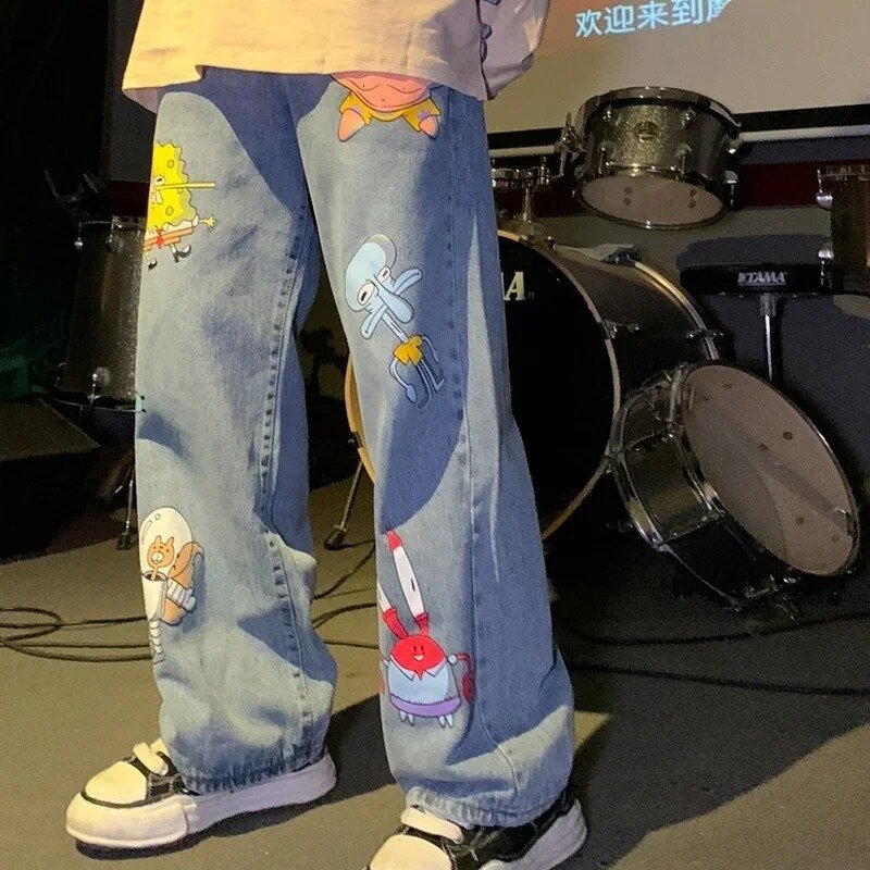 Celana Jeans Pria dan Wanita Lurus Longgar Musim Gugur Gaya Korea Kartun Dicetak Celana Jalan Hip-Hop Tampan Celana Sembilan Titik Mode