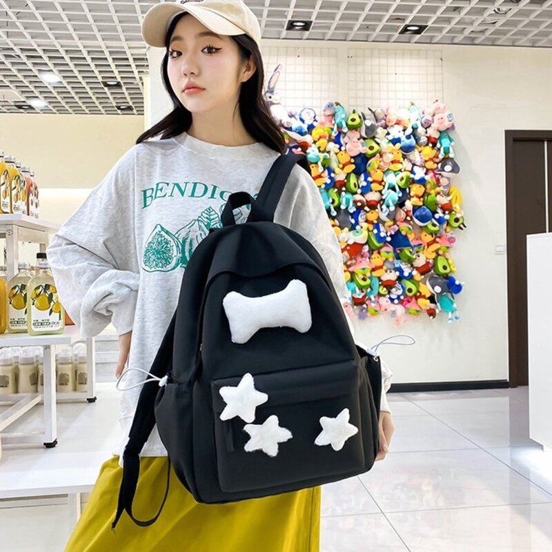 Mochila de nailon portátil con decoración de felpa para mujer, bolso escolar de alta capacidad, mochila de estrella que combina con todo, estudiantes