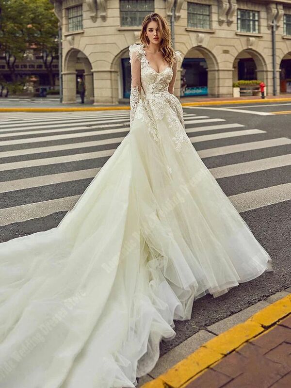 Gładkie, jasne, tiulowe suknie ślubne koronkowe z aplikacjami z długimi rękawami suknie ślubne Newset seksowna sukienka a-line Vestidos De Novias