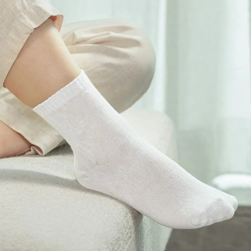 Calcetín de compresión portátil para hombre y mujer, calcetín desechable de tubo medio corto, suministros de viaje y Hotel, ideal para viaje de negocios