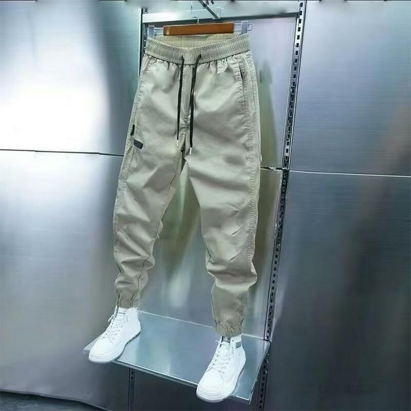 กางเกงฮาเร็มผู้ชายเอวยางยืดมีเชือกรูดกางเกงเข้ารูปเอวยางยืดดีไซน์นุ่มระบายอากาศได้ดี