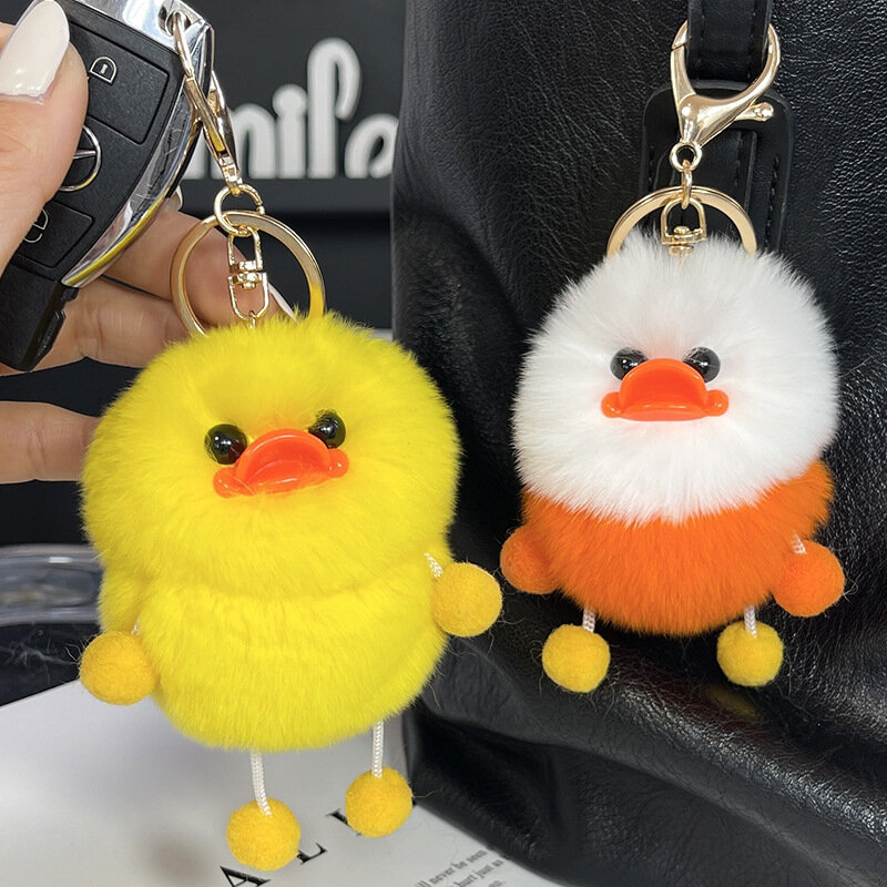Giveaway small yellow duck otter rabbit fur keychain
