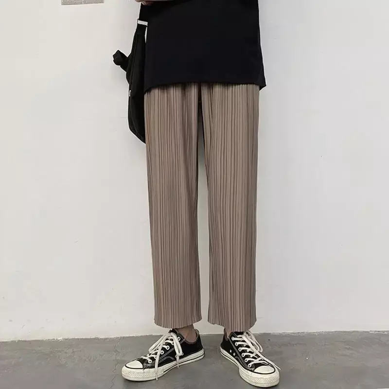 Casualowe spodnie męskie z prostymi rękawami Retro szerokie nogawkami cienkie i drapowane koreański Trend i przystojny Harun spodnie do kostek