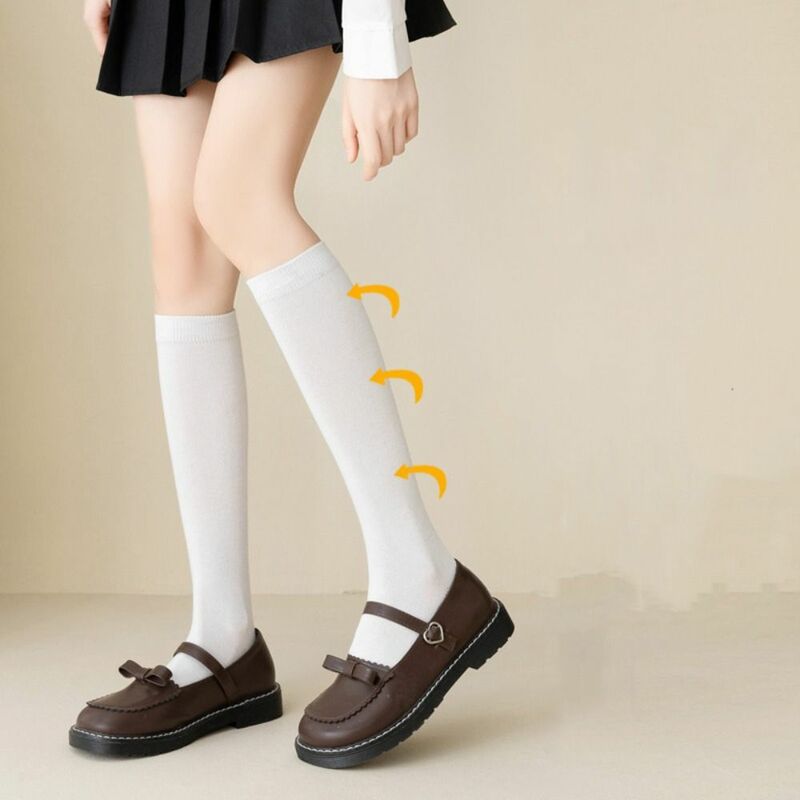 Calze da donna bianche Harajuku calze a metà polpaccio assorbenti dal sudore Jk Lolita ragazze stock festa in cotone tinta unita