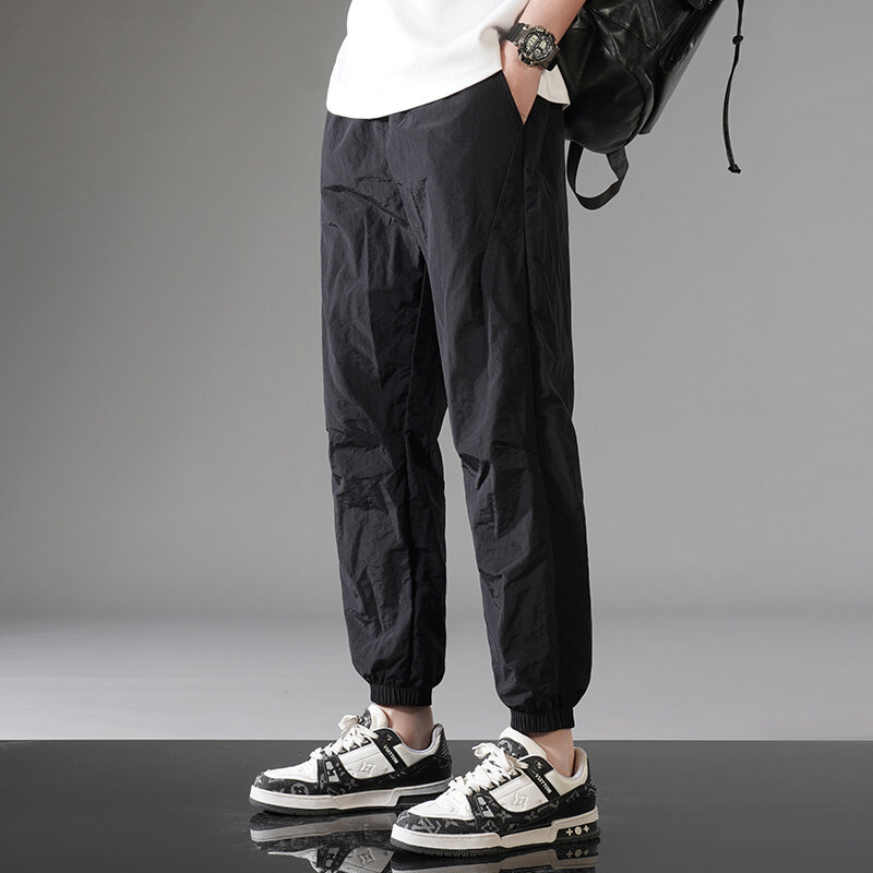 Pantalones cómodos informales de Color sólido para hombre, pantalón coreano Multicolor, cintura elástica, cordón, jóvenes, combina con todo, novedad de verano