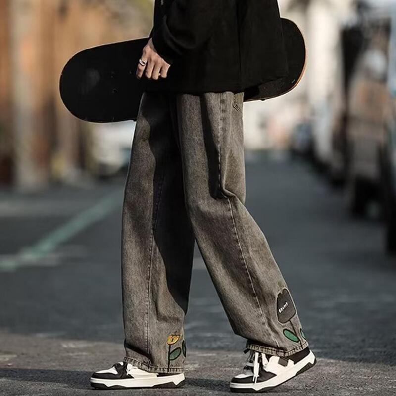 Джинсы мужские с застежкой-молнией, уличная одежда с широкими штанинами, модные джинсы с мультяшной цветочной вышивкой и эластичным поясом