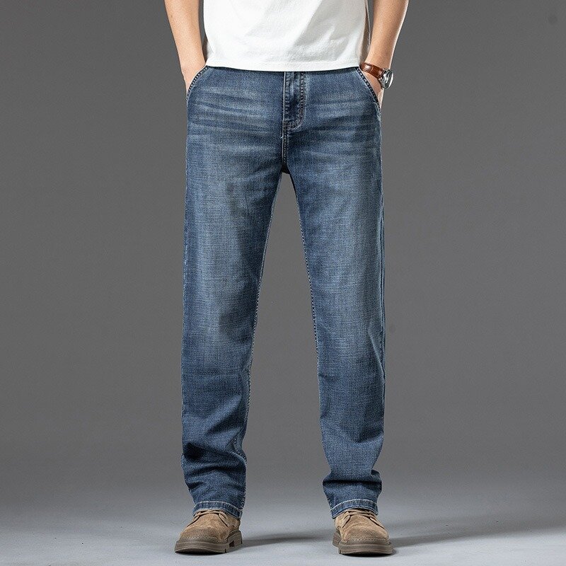 Jeans da uomo dritti grandi elastici sottili estivi Plus Size 42 44 46 48 pantaloni da uomo elasticizzati larghi da ufficio pantaloni larghi e leggeri
