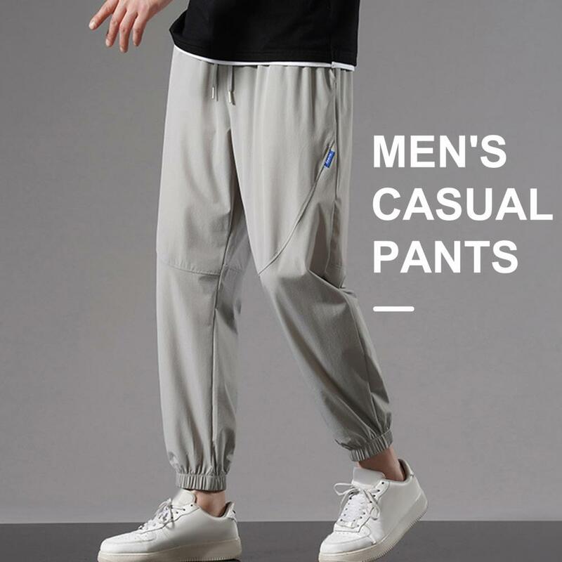 Calça de cintura elástica masculina, calça atlética, secagem rápida, calça esportiva com bolsos laterais, cordão para jogging