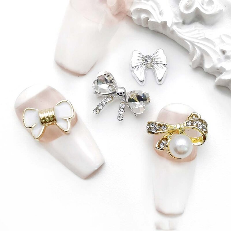 10 piezas de encantos de arte de uñas de corbata de lazo de aleación 3D con cristales y decoraciones de piedras de imitación en forma de mariposa, ópalo, lazo dorado/plata y piezas de uñas accesorias.