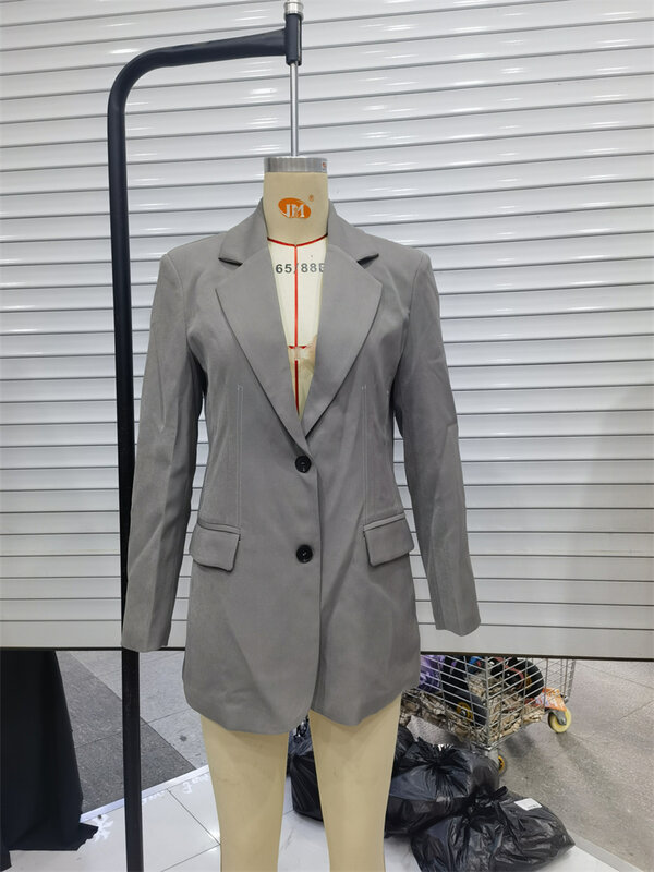 KEYANKETIAN-traje gris de oficina para mujer, ropa de exterior de ocio con bolsillos y solapa, decoración de líneas brillantes, novedad de 2024